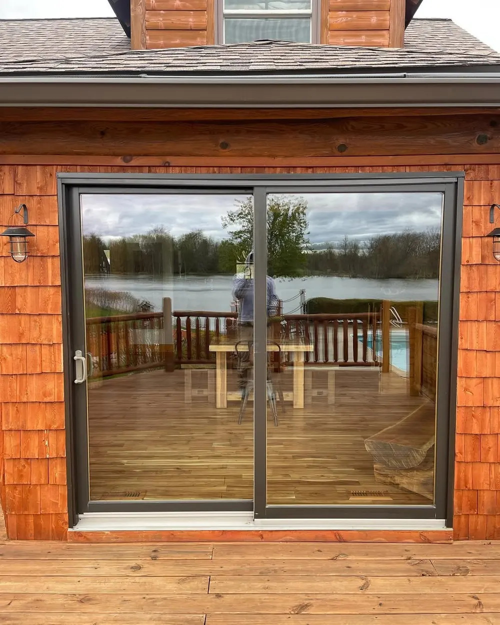 Spotless clean window overlooking a deck after window cleaning in Okemos, MI