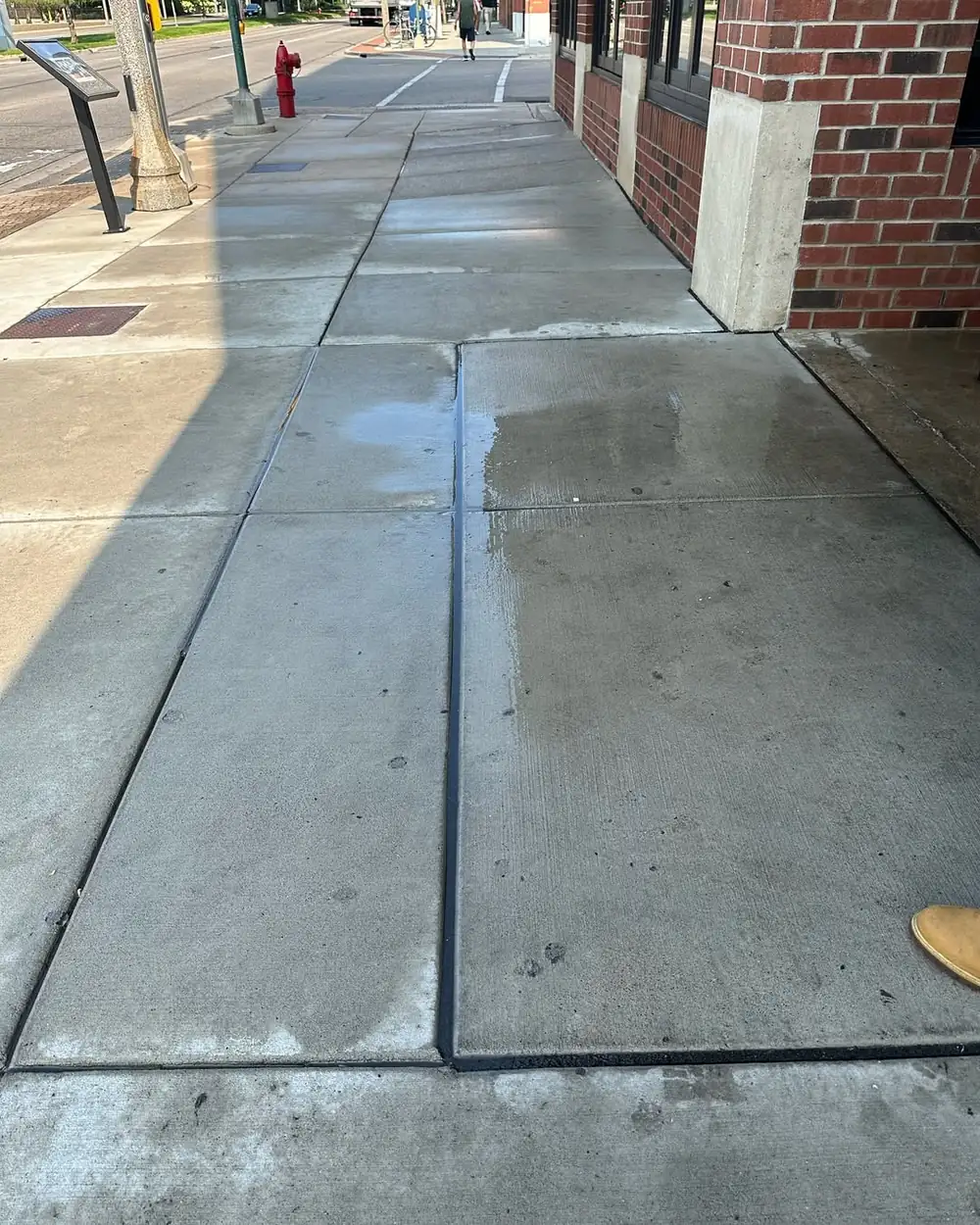 Freshly cleaned commercial sidewalk in Dewitt, MI