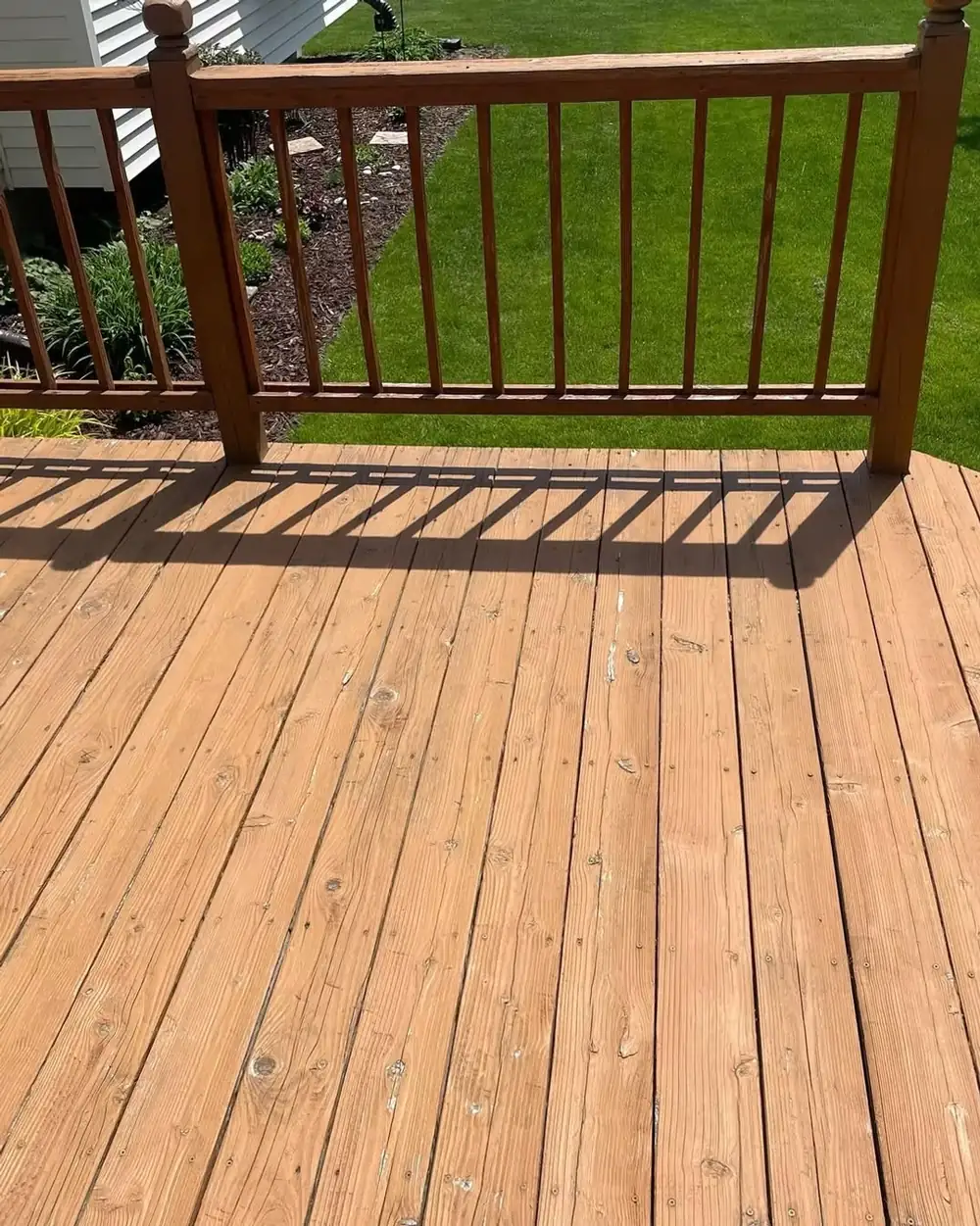 Wood deck cleaning at a residential property in Dewitt, MI
