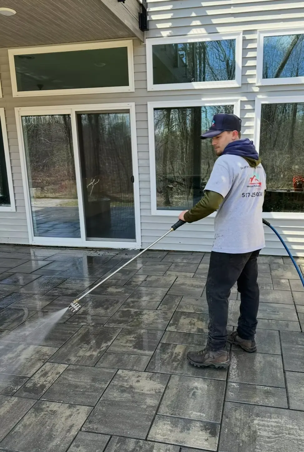 Concrete sealing service protecting a driveway in Okemos, MI