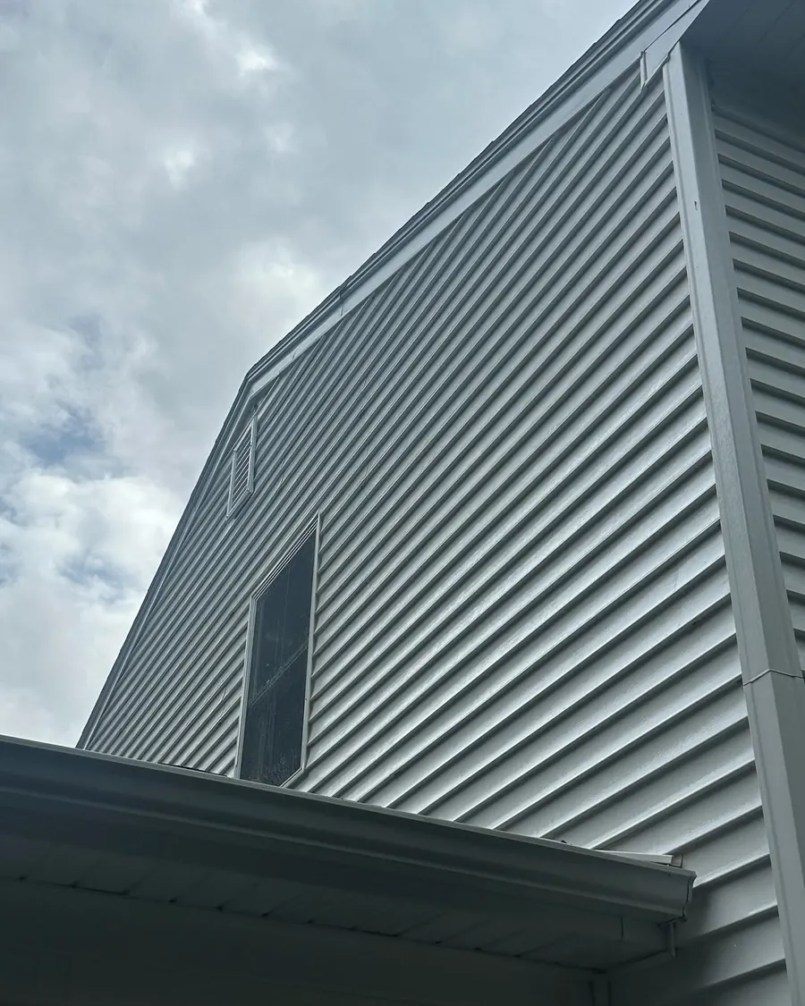 Clean home siding after professional exterior cleaning in Okemos, MI
