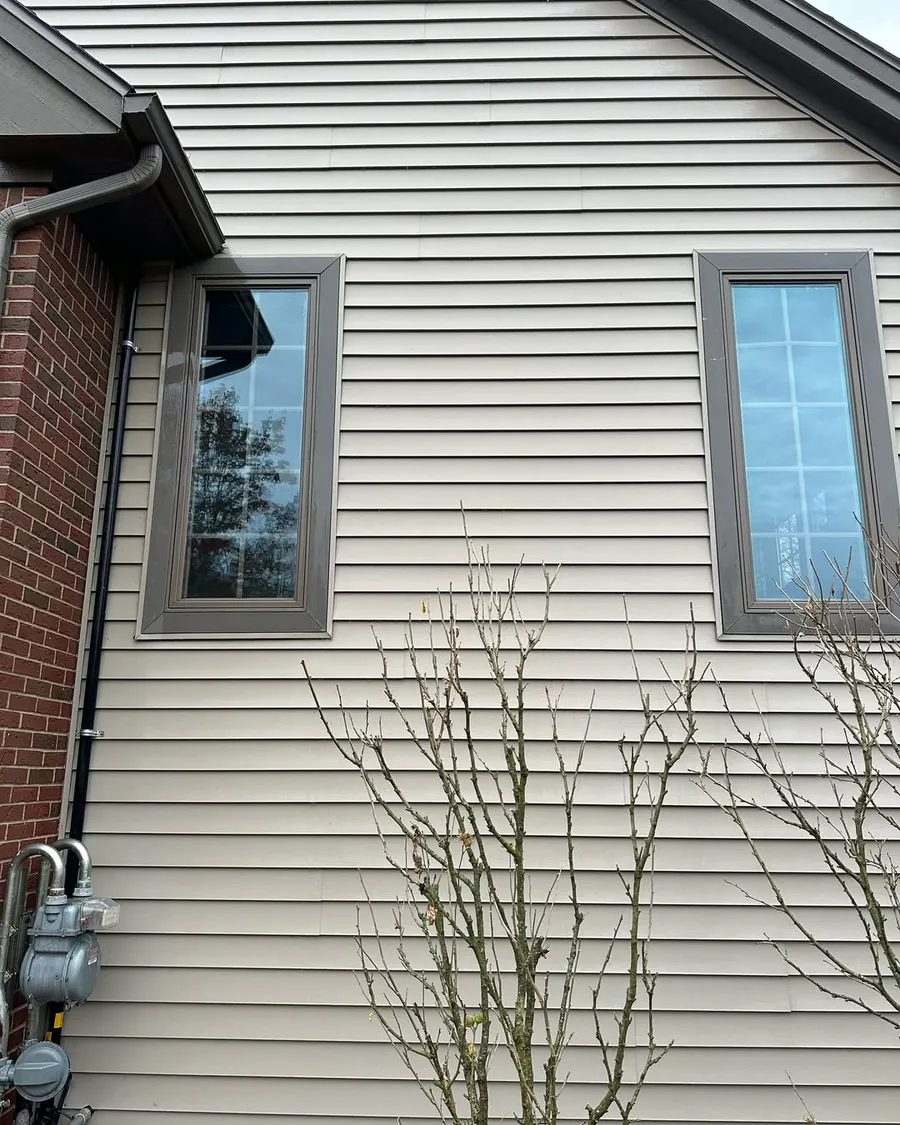 Clean home siding after professional exterior cleaning in Okemos, MI