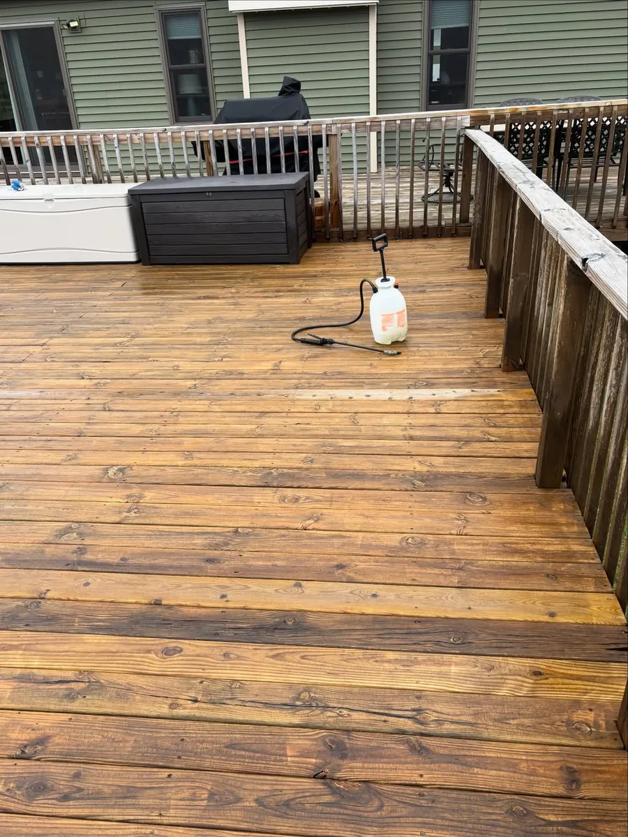 Clean wood deck after professional exterior cleaning in Okemos, MI
