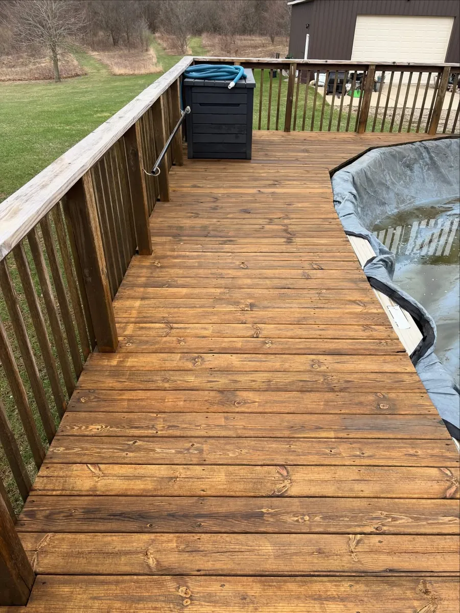 Restored wood deck after professional deck cleaning in Okemos, MI