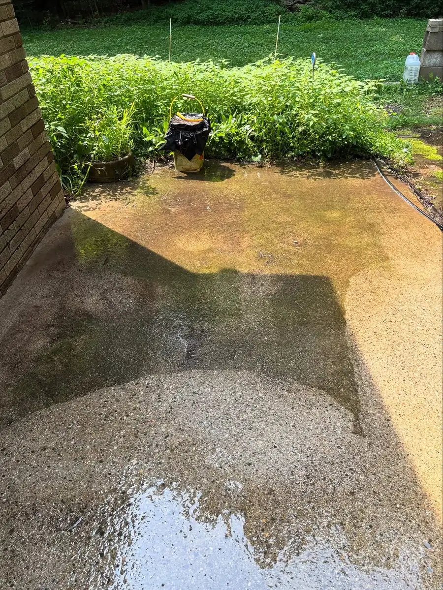 Weathered patio concrete before concrete sealing in Okemos, MI