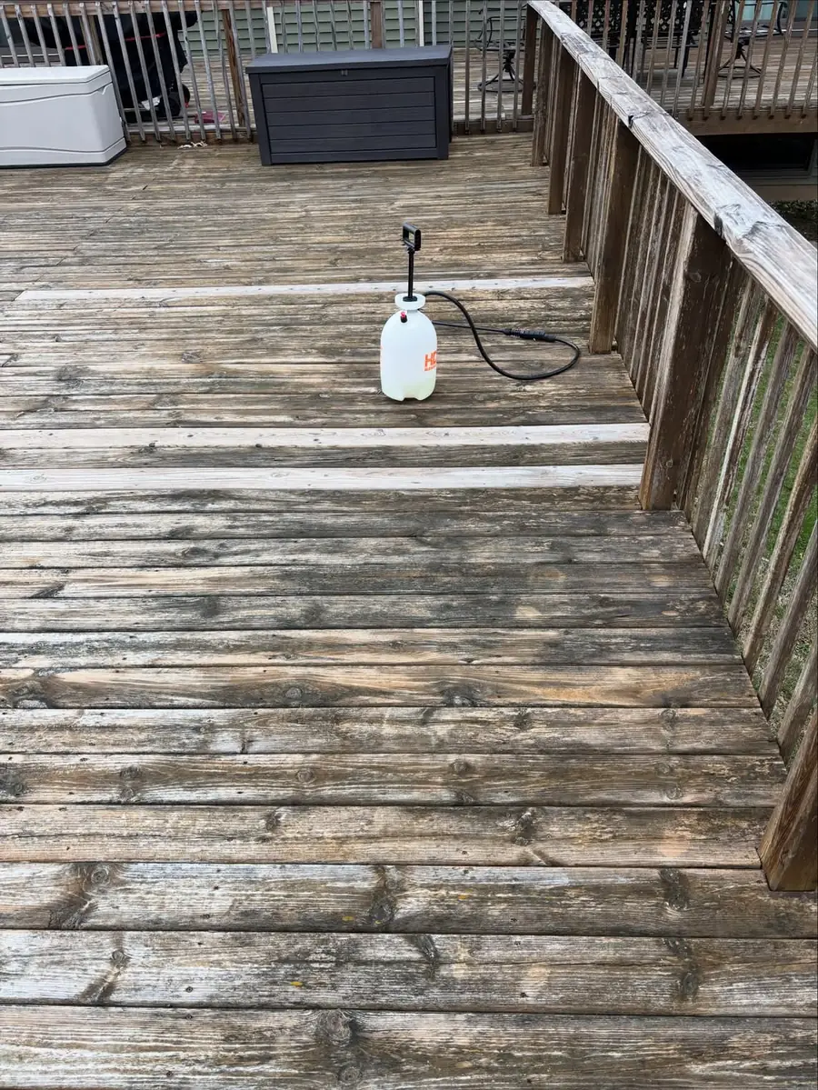 Dirty wood deck before professional exterior cleaning in Okemos, MI